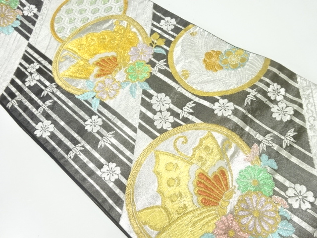 丸に蝶模様織出し袋帯